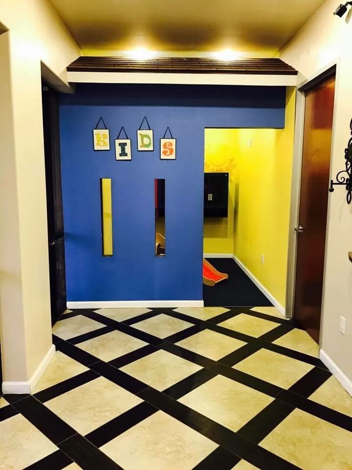 The blue-walled entrance to the kids area at Story Dental